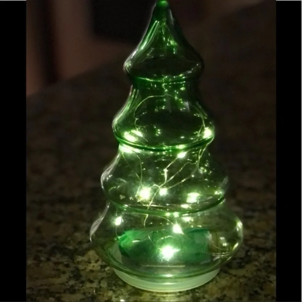 Glass Christmas tree that lights up with fairy lights